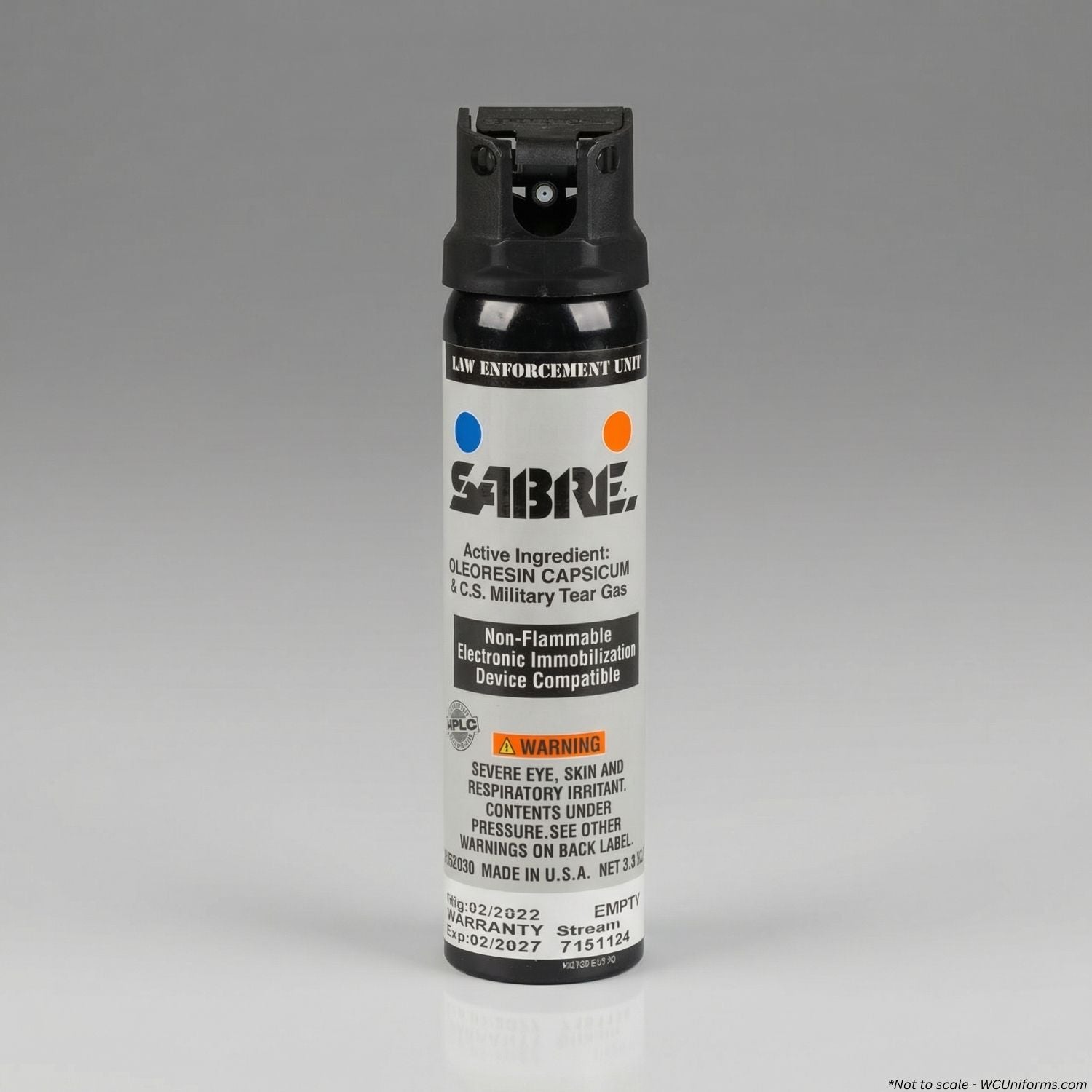 Sabre pepper spray canister on a gray background