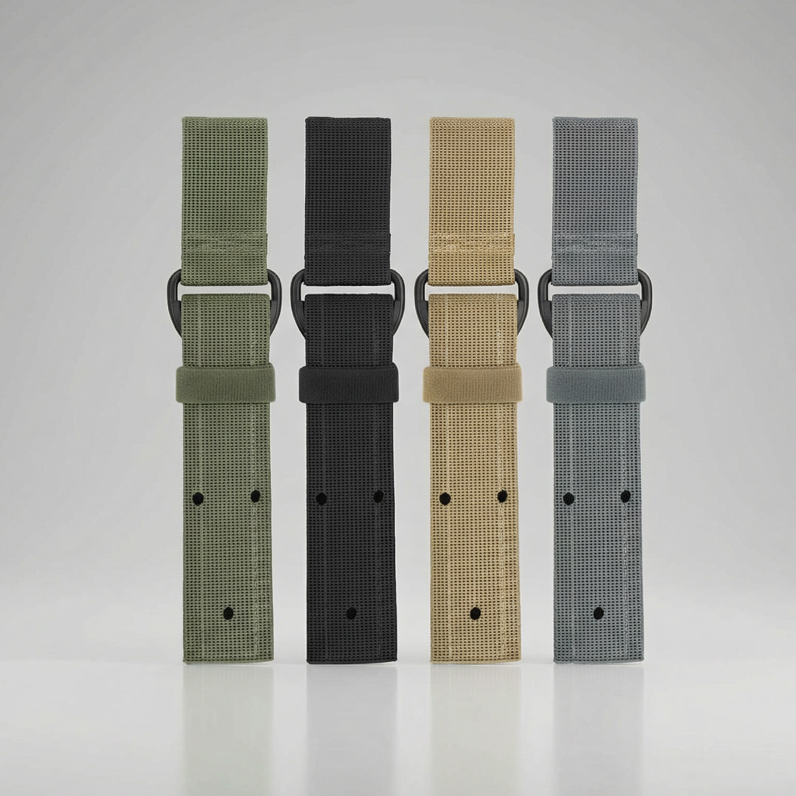 Four Safariland Model 6009-11 Single Strap Leg Only in different colors on a gray background