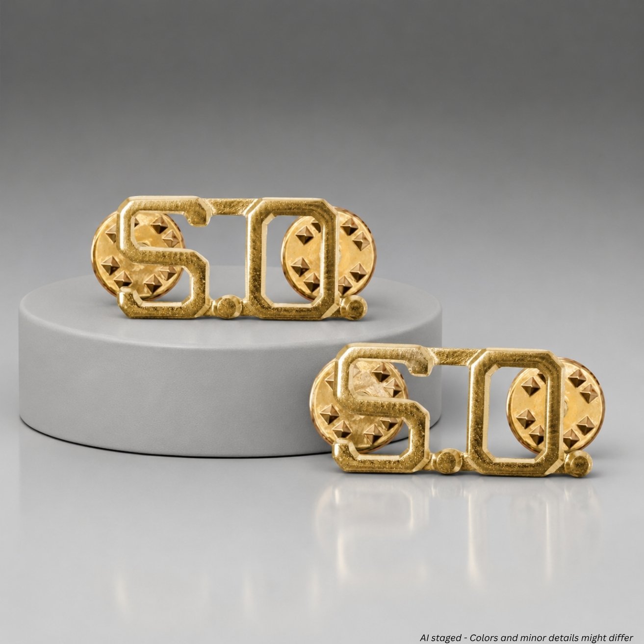 First Class S.O. Collar Pins in gold plate finish, item number IN50, pair of two pins displayed on a pedestal