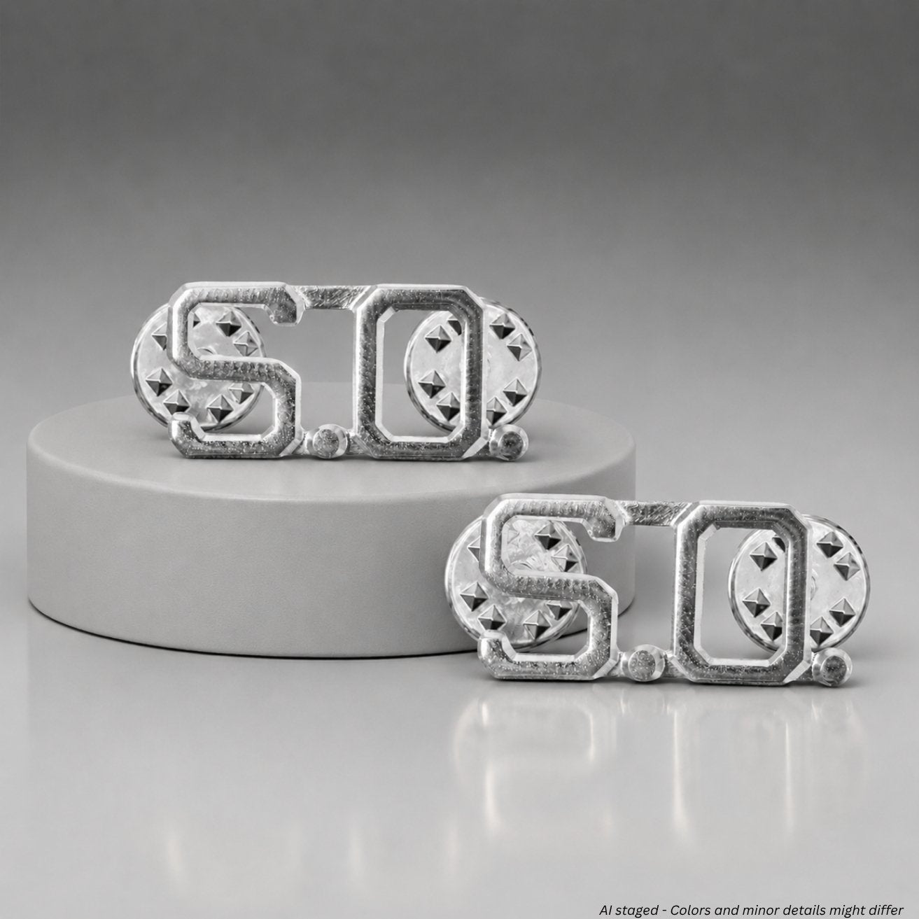 First Class S.O. Collar Pins in silver nickel plate finish, item number IN51, pair shown on display pedestal