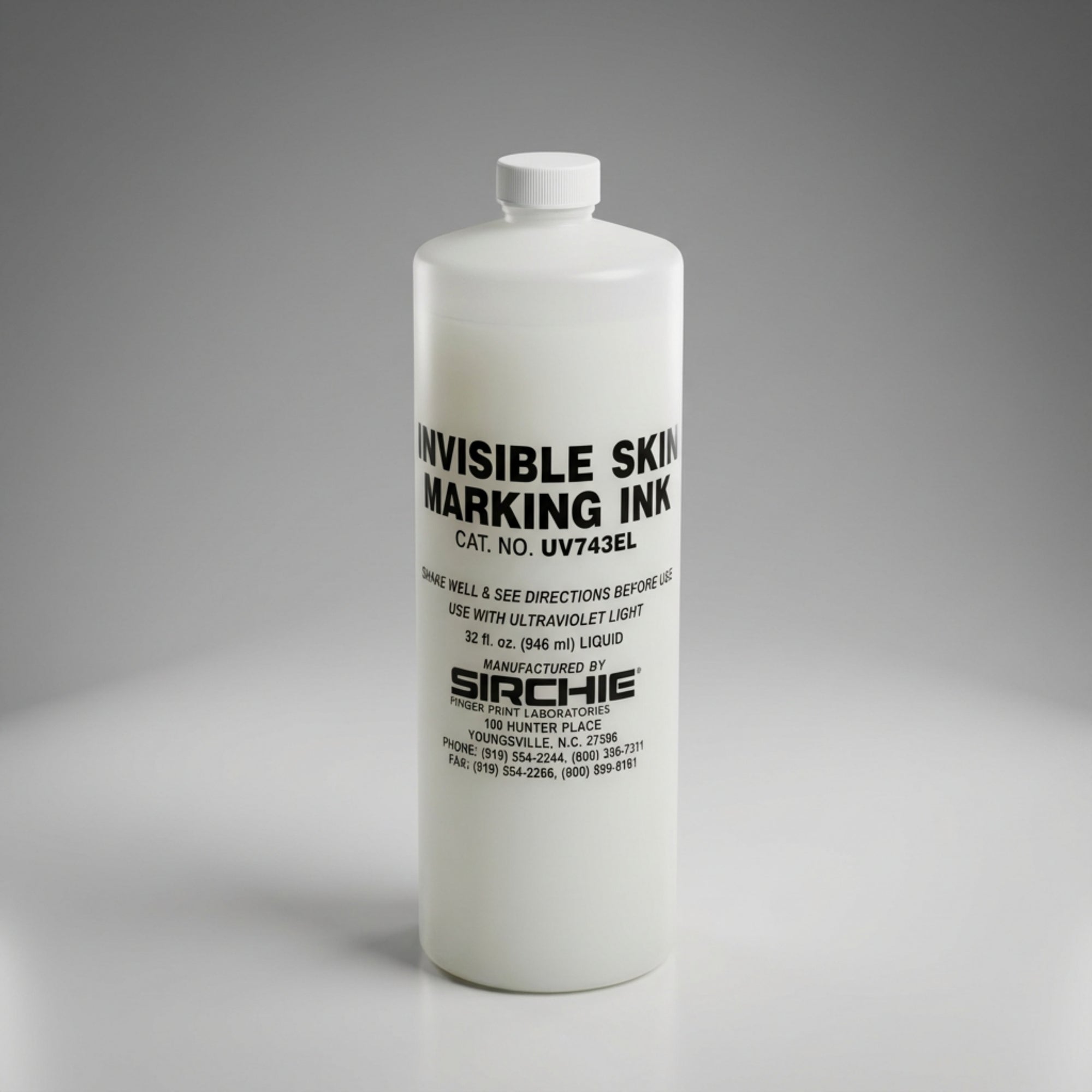 Bottle of SIRCHIE invisible skin marking ink on a gray background