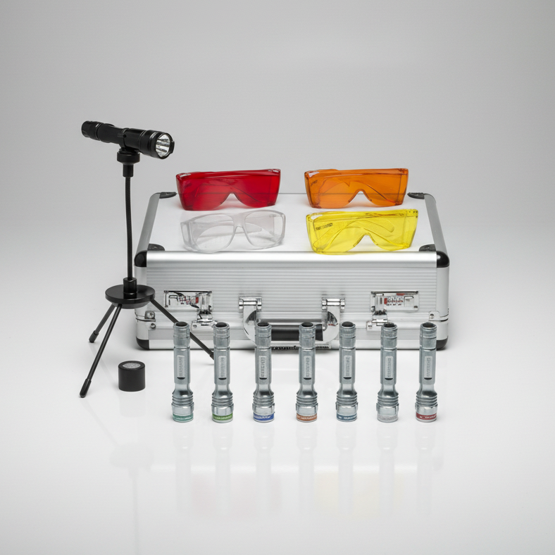 Sirchie MegaMAXX™ 3-Watt Alternate Light System MMX300. Set of colorful safety glasses, case and a flashlight on a gray background