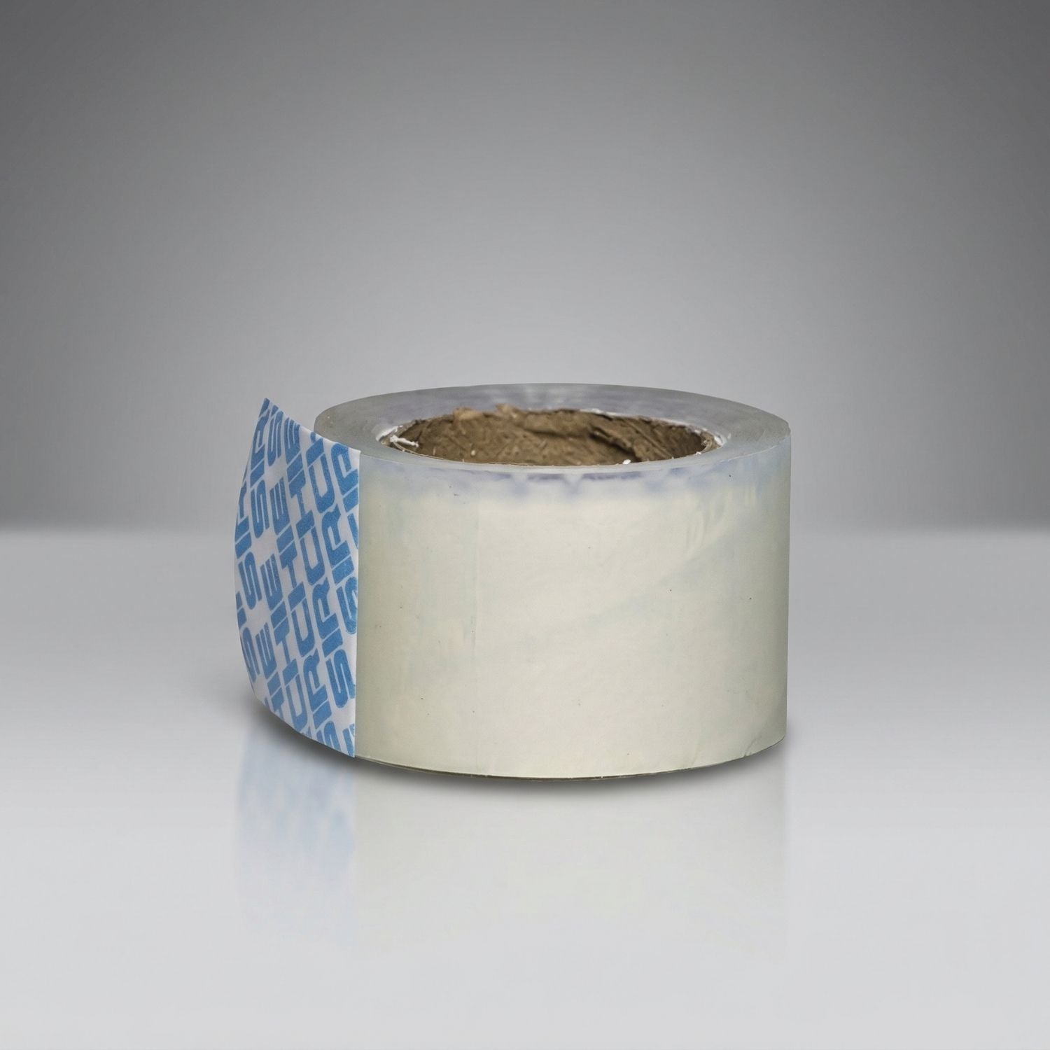 Roll of tape with a gray background