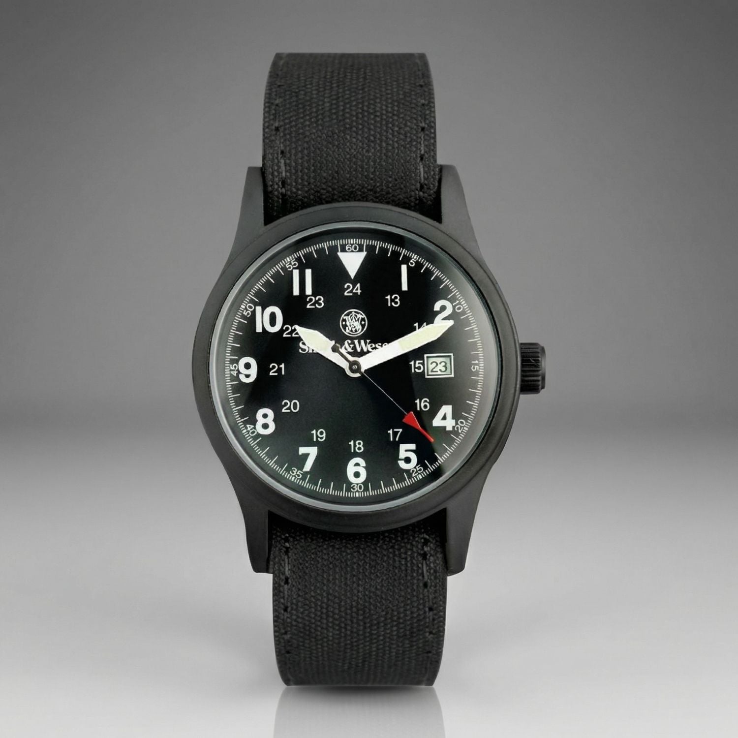 Black watch with a detailed face on a gray background