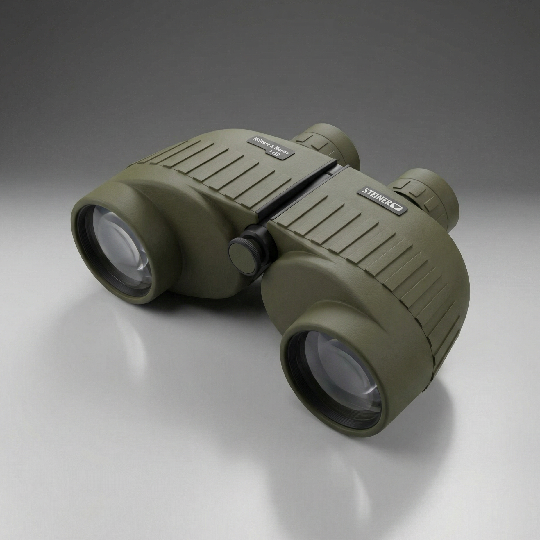 Green binoculars on a reflective surface with a gray background
