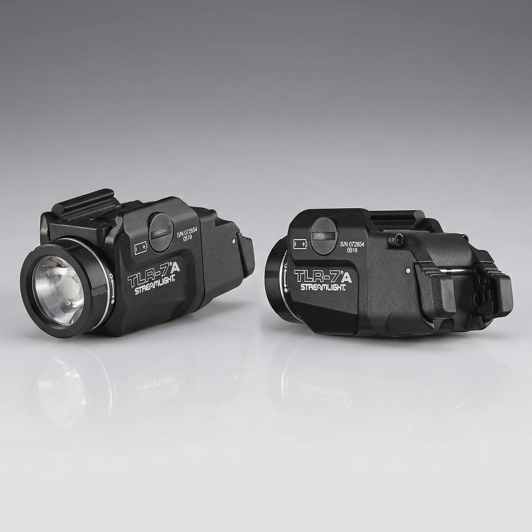 Two tactical Streamlight TLR-7A High Switch Weapon Light 500 Lumens 69423 with 'Streamlight' branding on a gray background