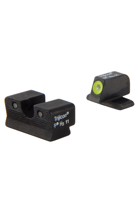 Two black firearm sight components with a green dot on a white background