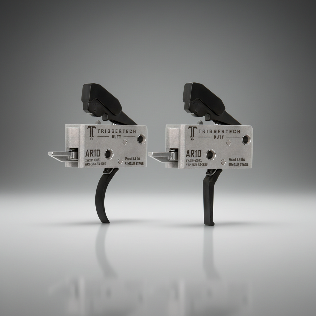 Two TriggerTech AR10 trigger mechanisms on a gray background
