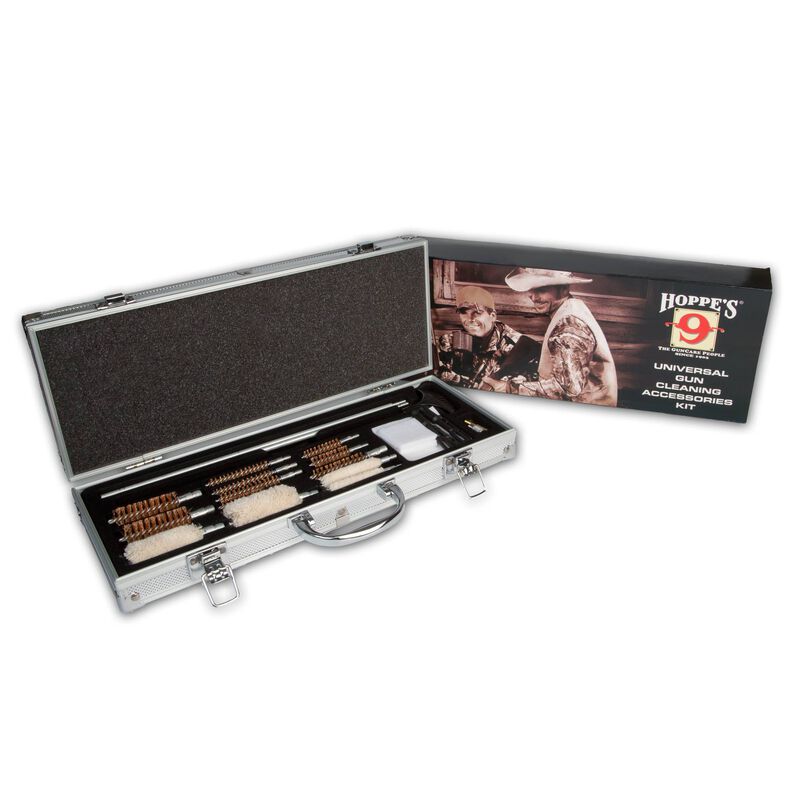 Gun cleaning kit with tools in an open case on a white background