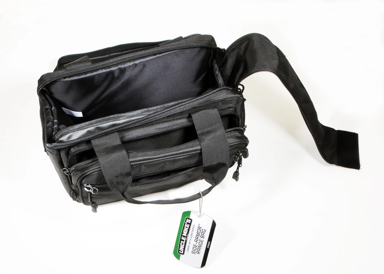 Open Black bag with a visible brand tag on a white background. Uncle Mike’s Side-Armor 17in Deluxe Range Equipment Bag black 53411