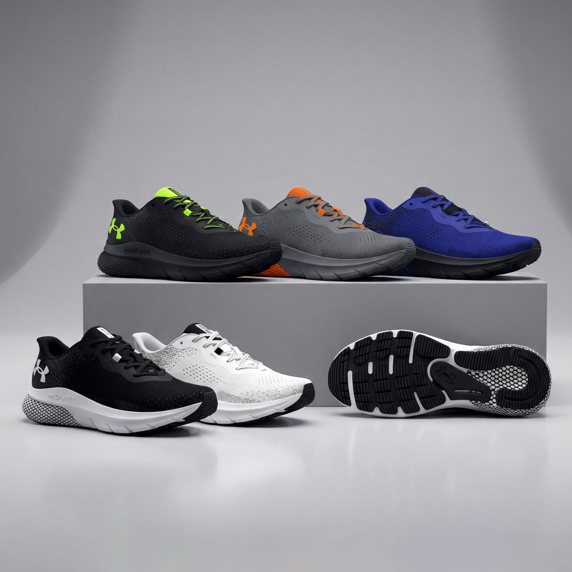 Collection of running shoes on a gray background