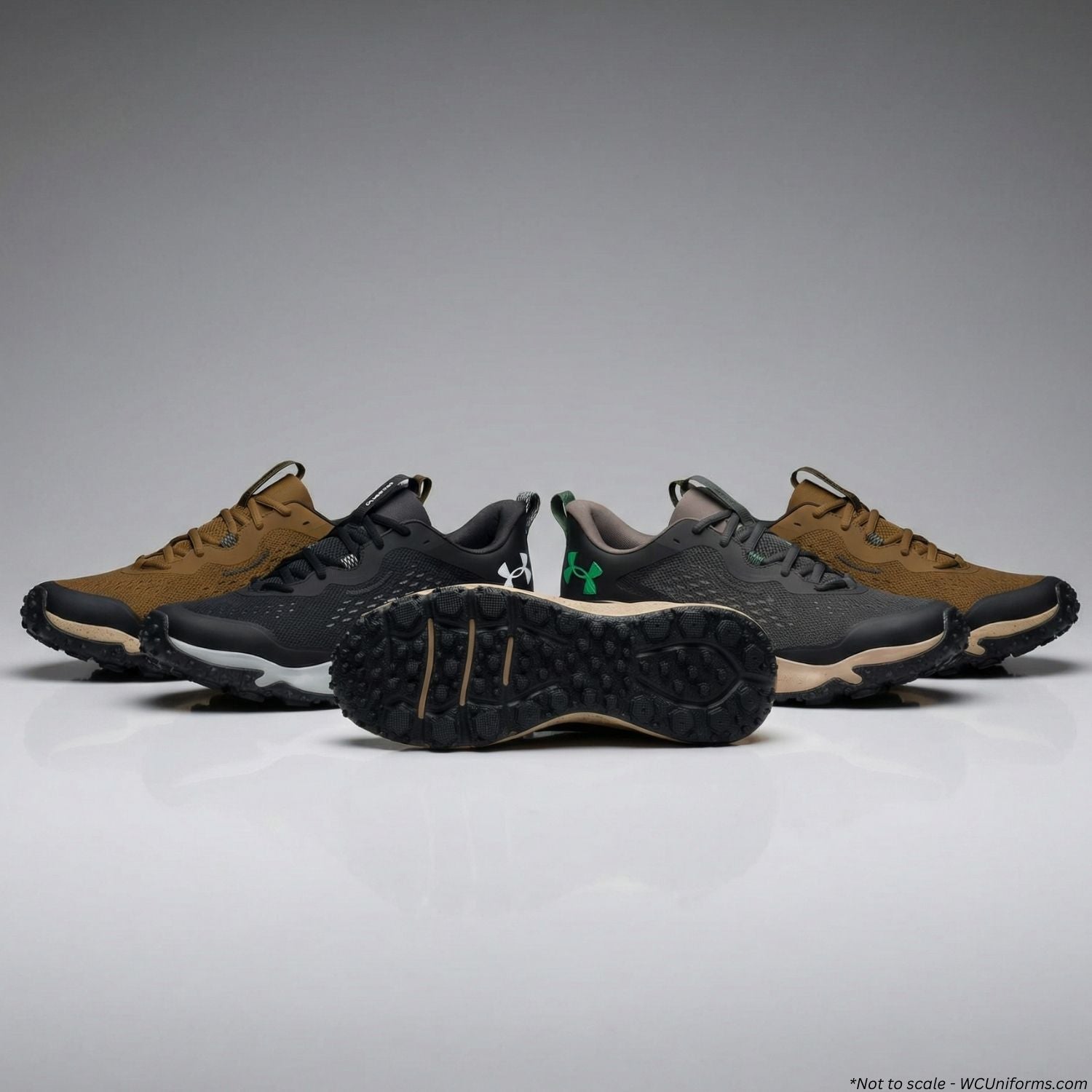 Set of hiking shoes in various colors on a gray background