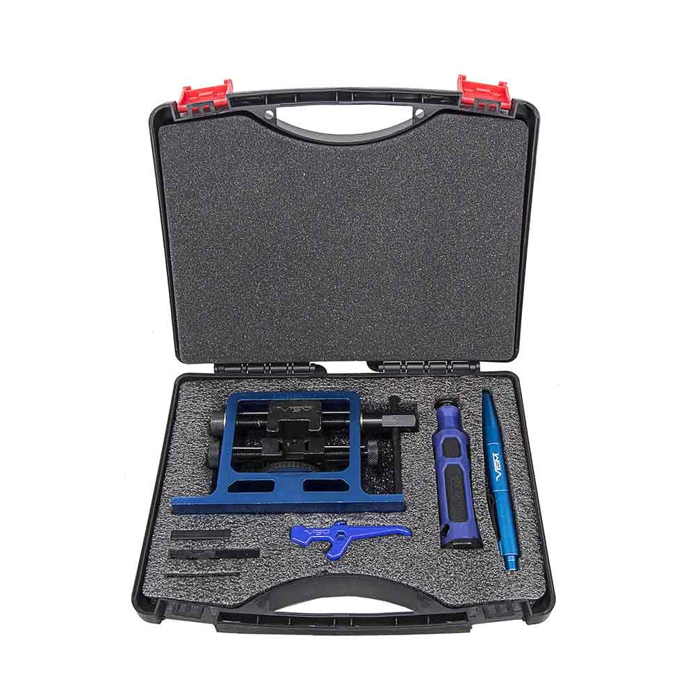 Tool kit with various tools inside an open black case on a white background