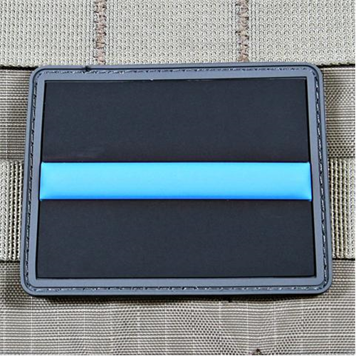 Violent Little Machine Shop Thin Blue Line patch featuring a blue stripe on a black background, perfect for display on gear.