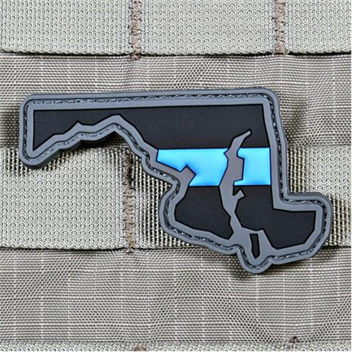 Thin Blue Line patch featuring the outline of Florida, showcasing intricate details on a tactical background.