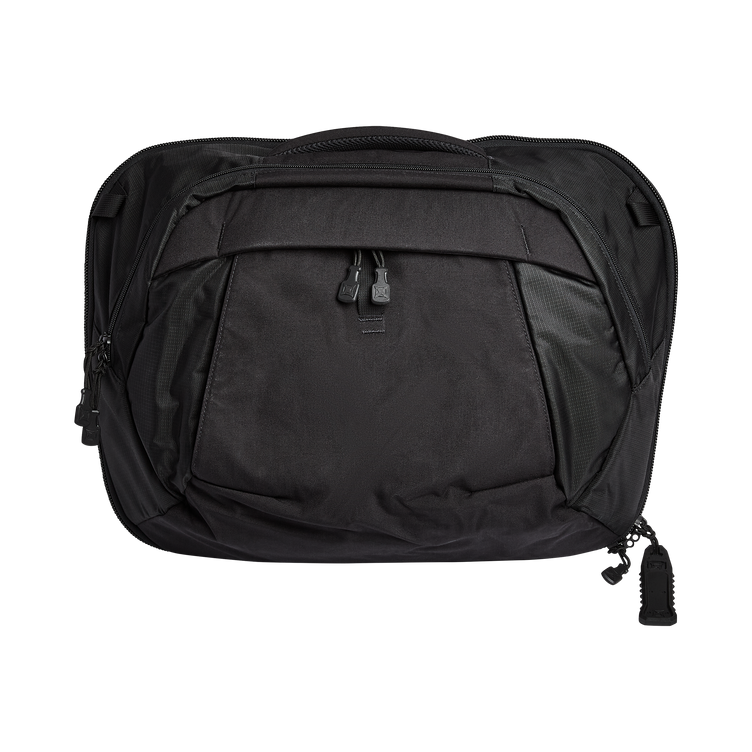 Vertx Pro Keryx bag in sleek black, ambidextrous design for versatile use, convertible from sling to messenger style.