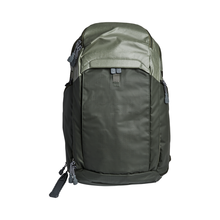 Vertx Pro Gamut backpack in green, designed for comfort and utility with customizable features and spacious storage.