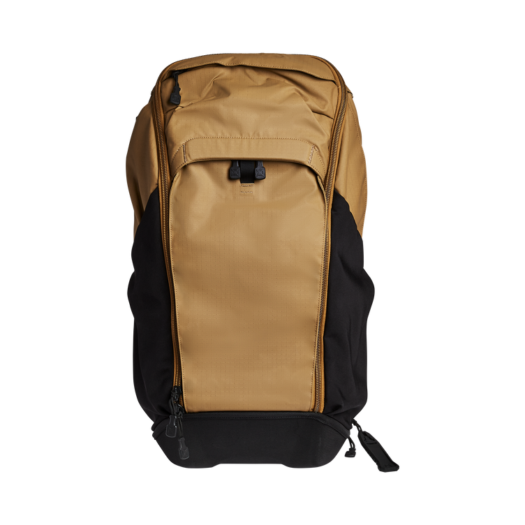 Vertx Pro Basecamp backpack in tan and black, designed for discreet gear storage and easy access.