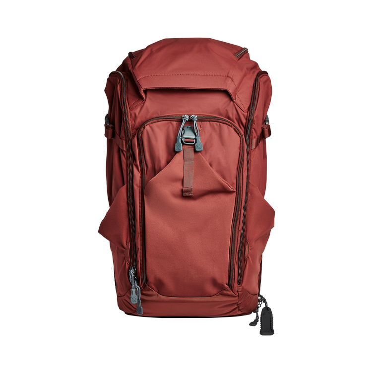 Vertx Pro Overlander backpack in red with multiple compartments and admin pockets for organized storage.