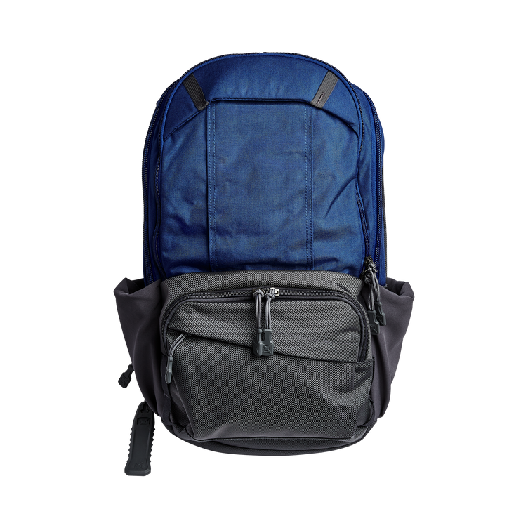 Vertx Pro Readypack in blue and gray, featuring multiple storage pockets and a sleek, tactical design.