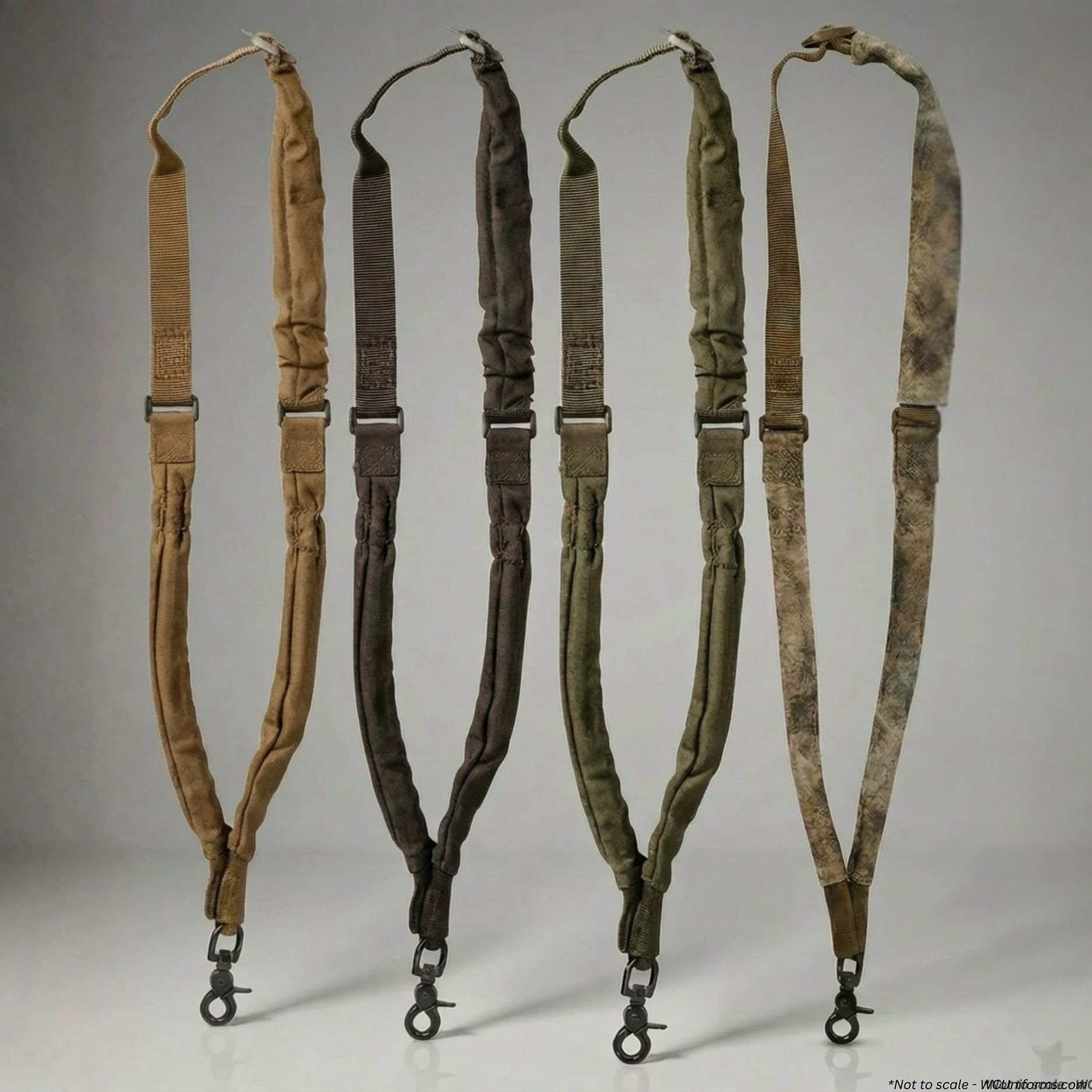Five military-style rifle slings in different colors on a gray background