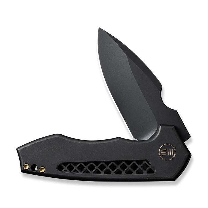 We Knife Harpen Flipper Knife featuring a sleek titanium handle and a sharp black blade for durability and style.