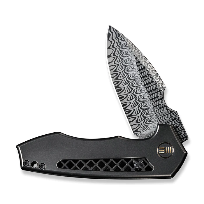 We Knife Harpen Flipper Knife with titanium handle, featuring a unique patterned blade design and sleek black grip.