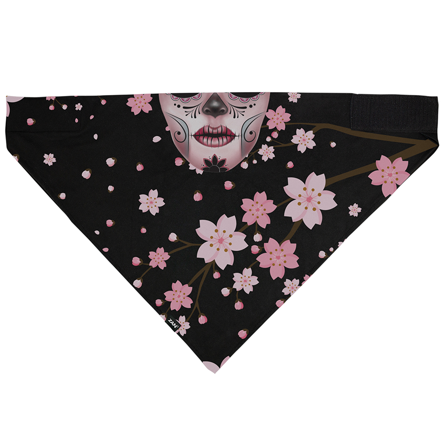 Zan Headgear Bandanna with floral design and skull, offers comfort and UV protection under helmets or alone.