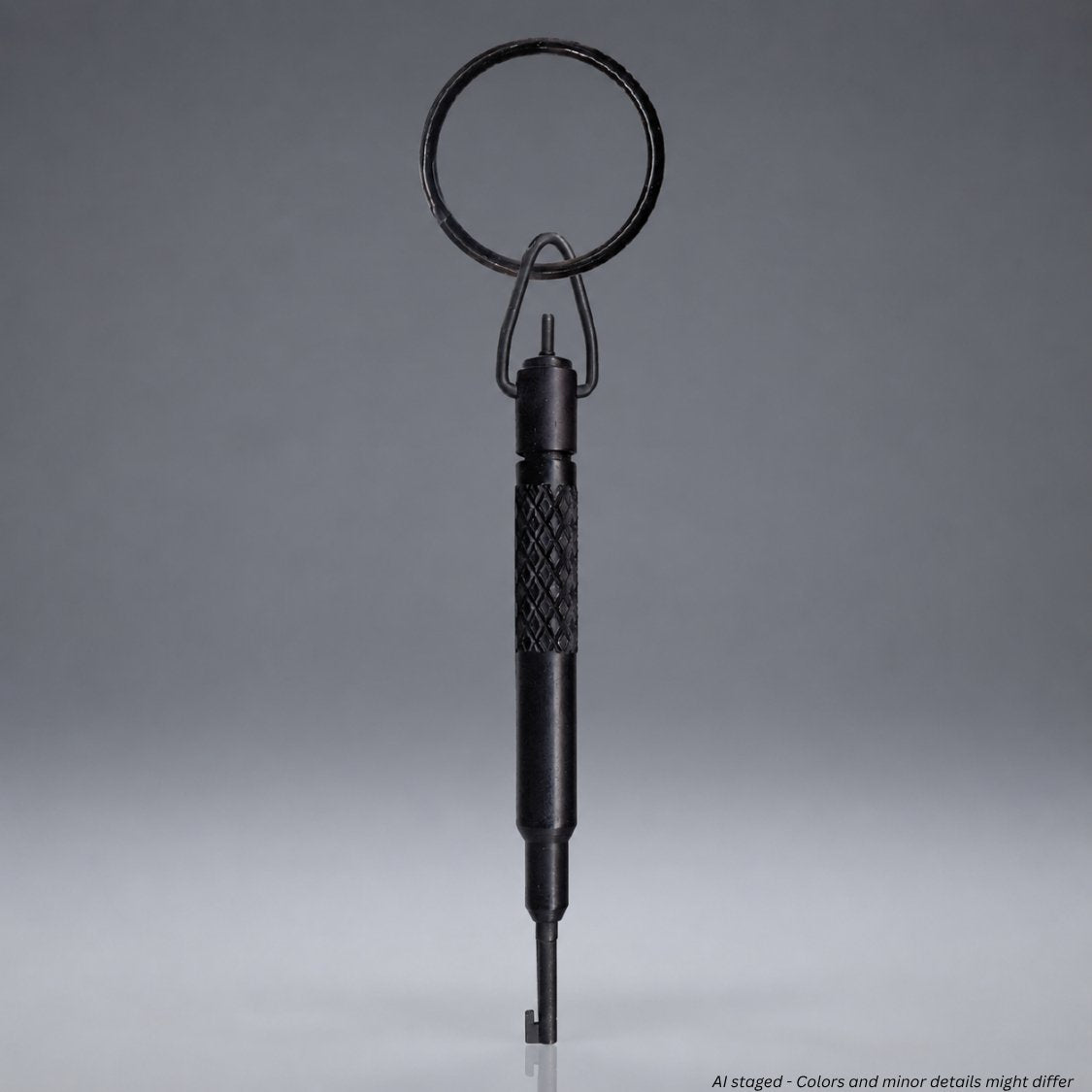 Zak Tool high security S&W 104 swivel handcuff key model ZT11-LG-104 in matte black, featuring a diamond-knurled center grip, swivel bail, and split key ring against a gray background