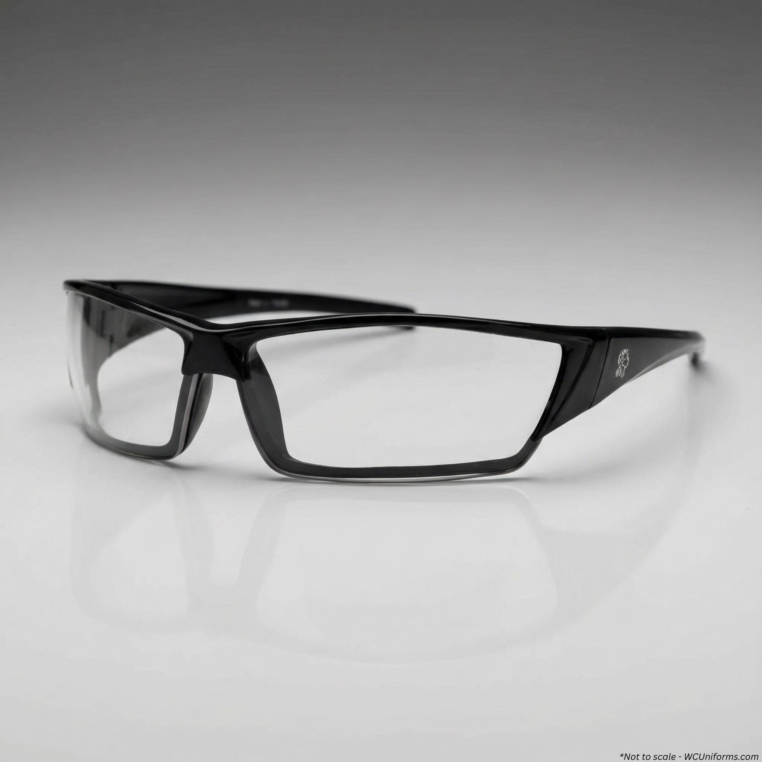Black safety glasses on a gray background