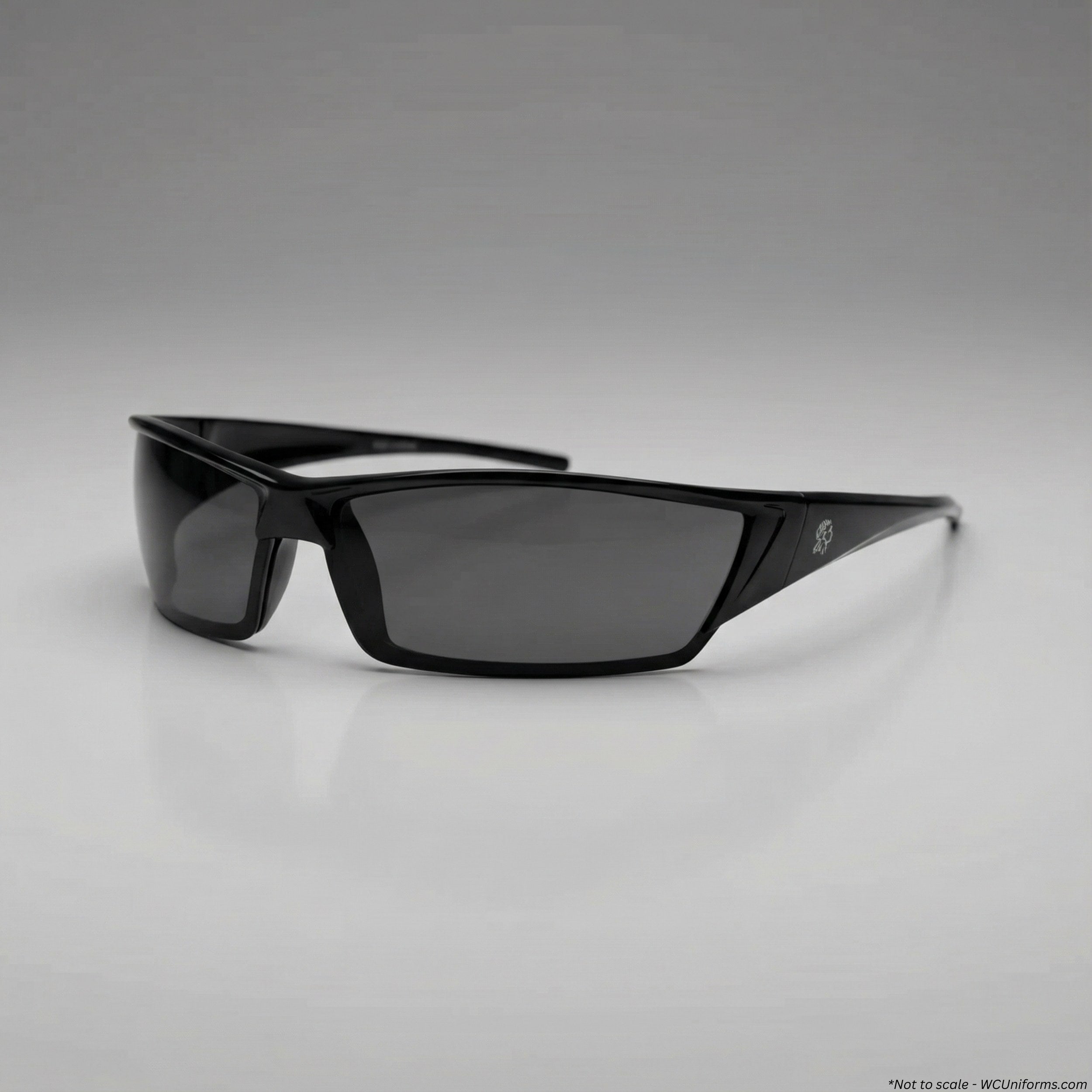 Black sunglasses on a gray background