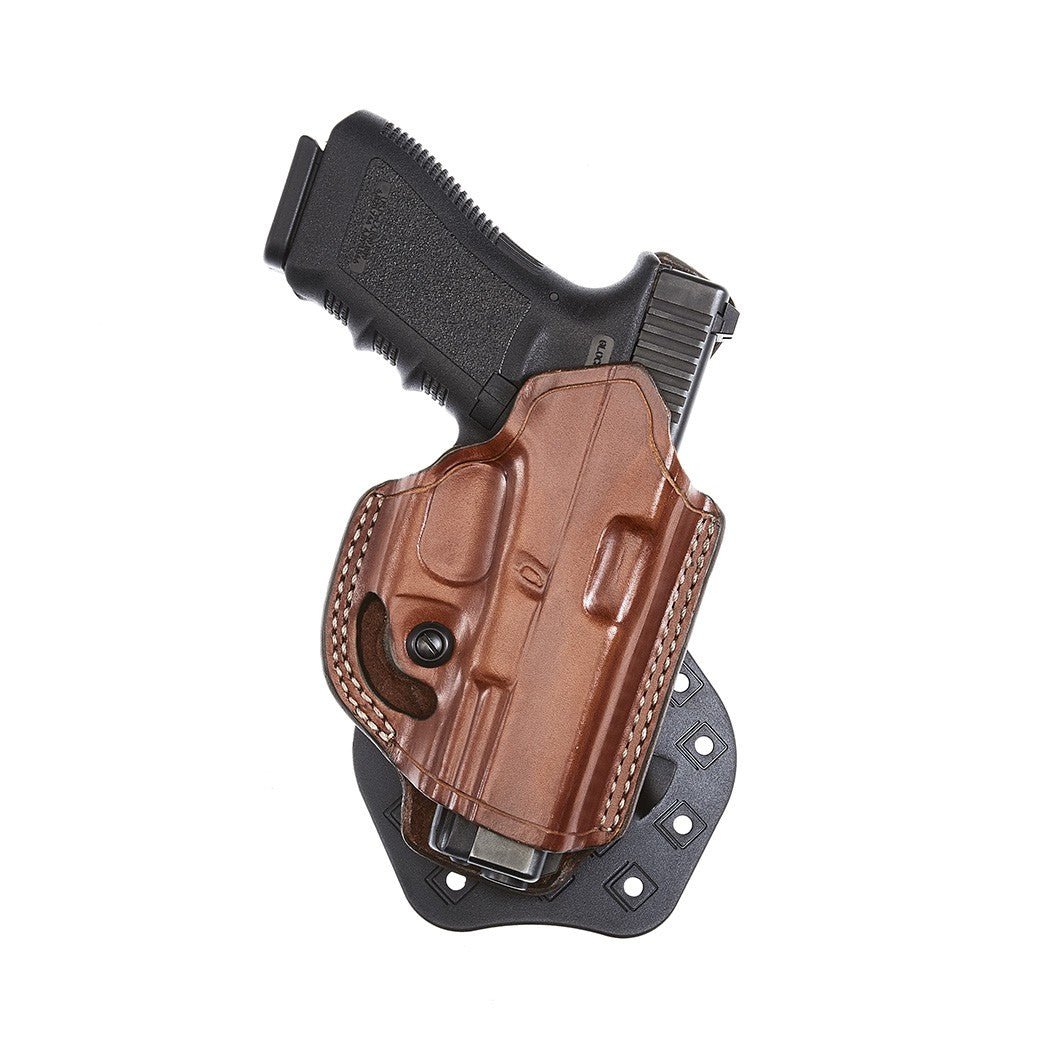 Aker Leather FlatSider XR19 Paddle Holster with pistol, featuring dual retention barbs for secure concealment and comfort.
