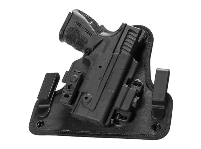 Alien Gear ShapeShift 4.0 IWB Holster featuring a firearm and tactical light, designed for concealed carry comfort.