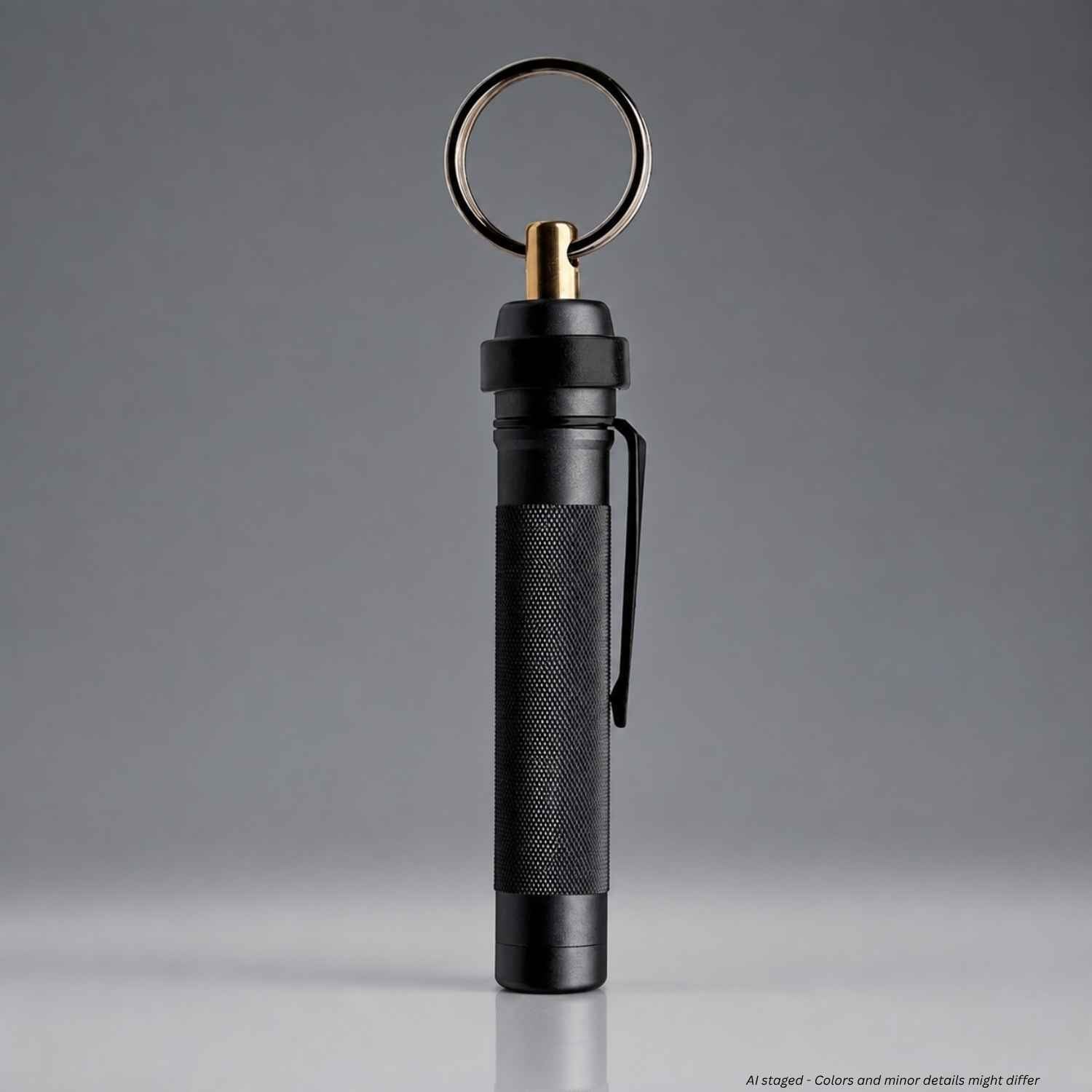 Black ASP Metro Defender D1 OC Spray with brass actuator, key ring, and belt clip