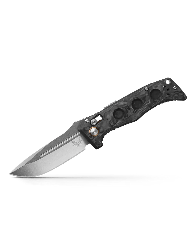 Benchmade Mini Adamas knife with marbled carbon fiber handle and satin-finished blade, showcasing refined style and utility.