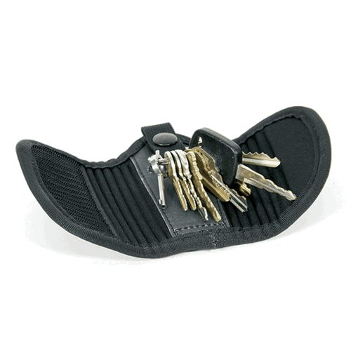 Black key holder with keys on a white background