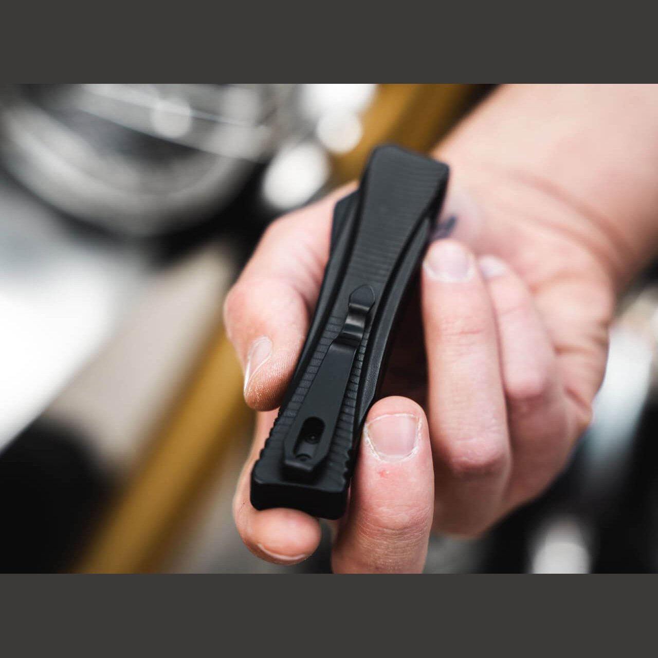 Pocket clip side of the closed Böker Plus Eagle 2.0 OTF automatic knife