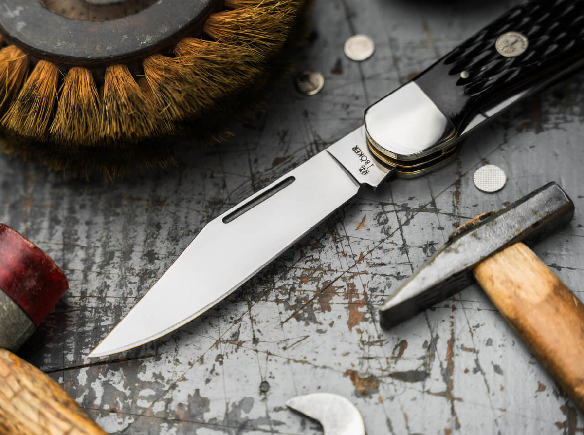 Clip point blade of the Boker Treebrand Folding Hunter with Boker tang stamp and nickel silver bolster