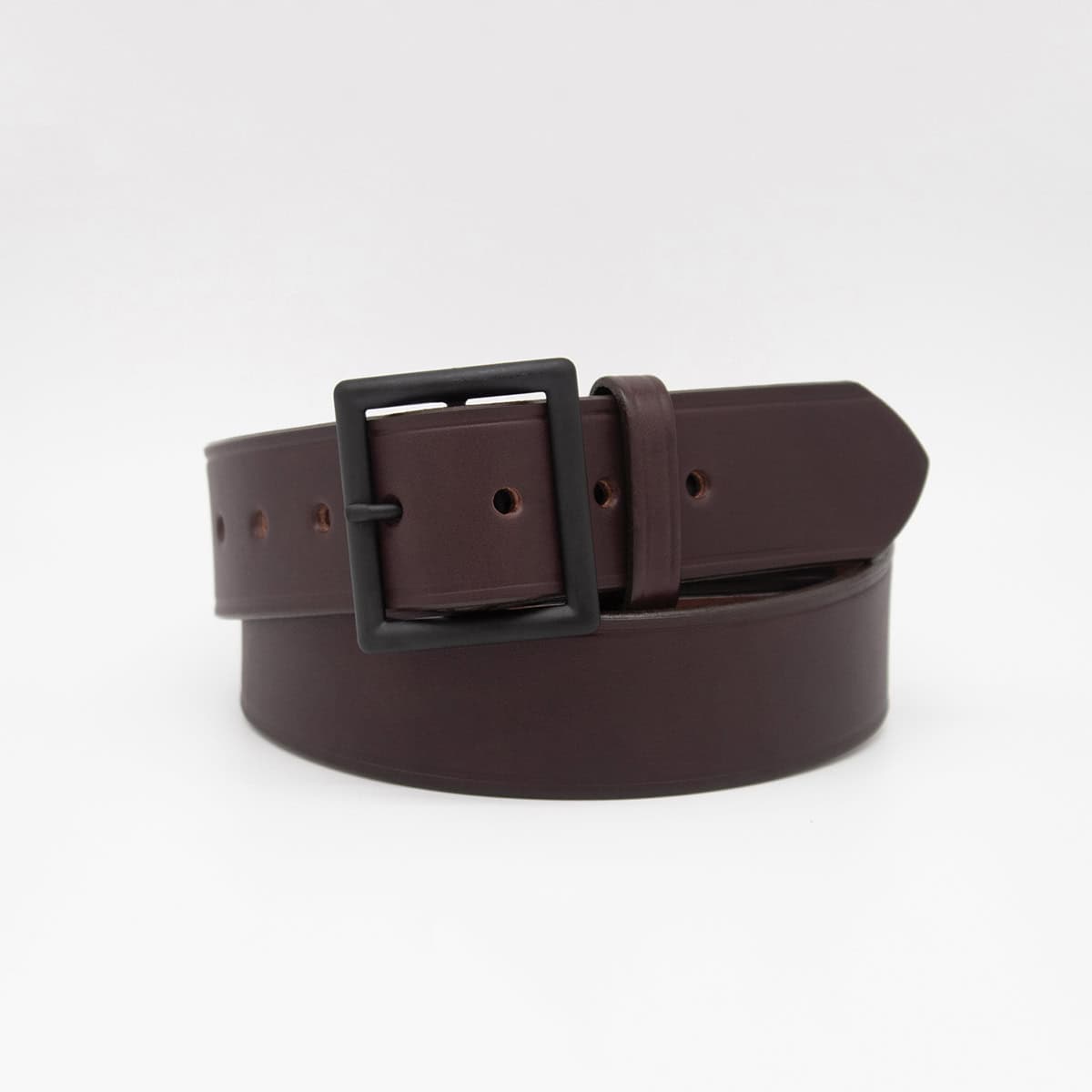A dark brown leather belt with a matte black rectangular buckle, coiled and presented on a clean white background.