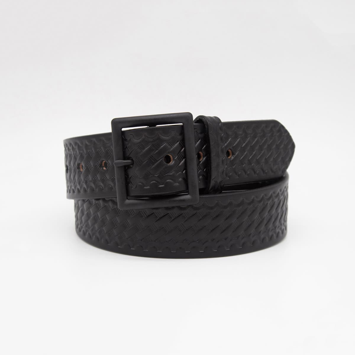 A black woven leather belt with a matching matte black metal buckle, coiled on a light gray background.