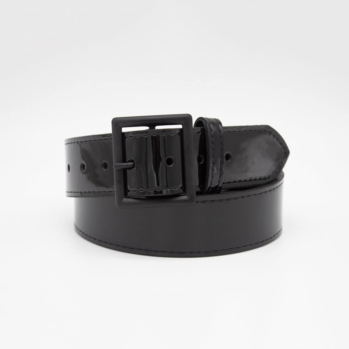 Black high gloss leather belt with a large buckle on a white background