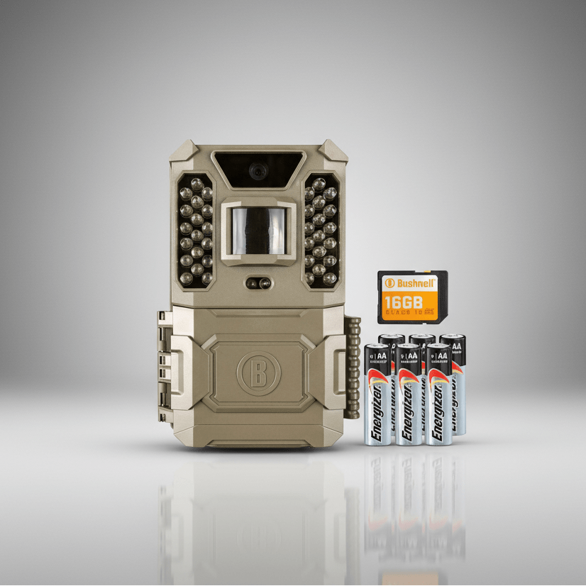 Bushnell 24MP Trail Camera Prime Brown Low Glow 119932CB - Combo 16GB SD with batteries and memory card on a gray background