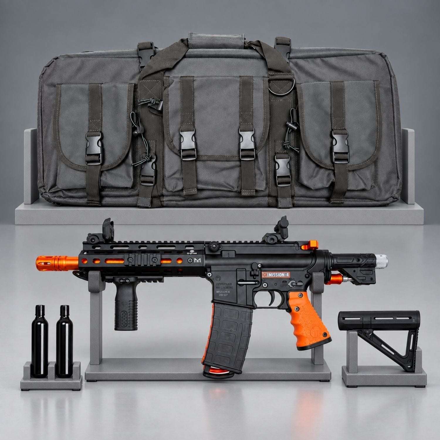 Byrna Mission-4 launcher kit with gray carrying bag, two CO2 cylinders and detached stock on gray display racks.