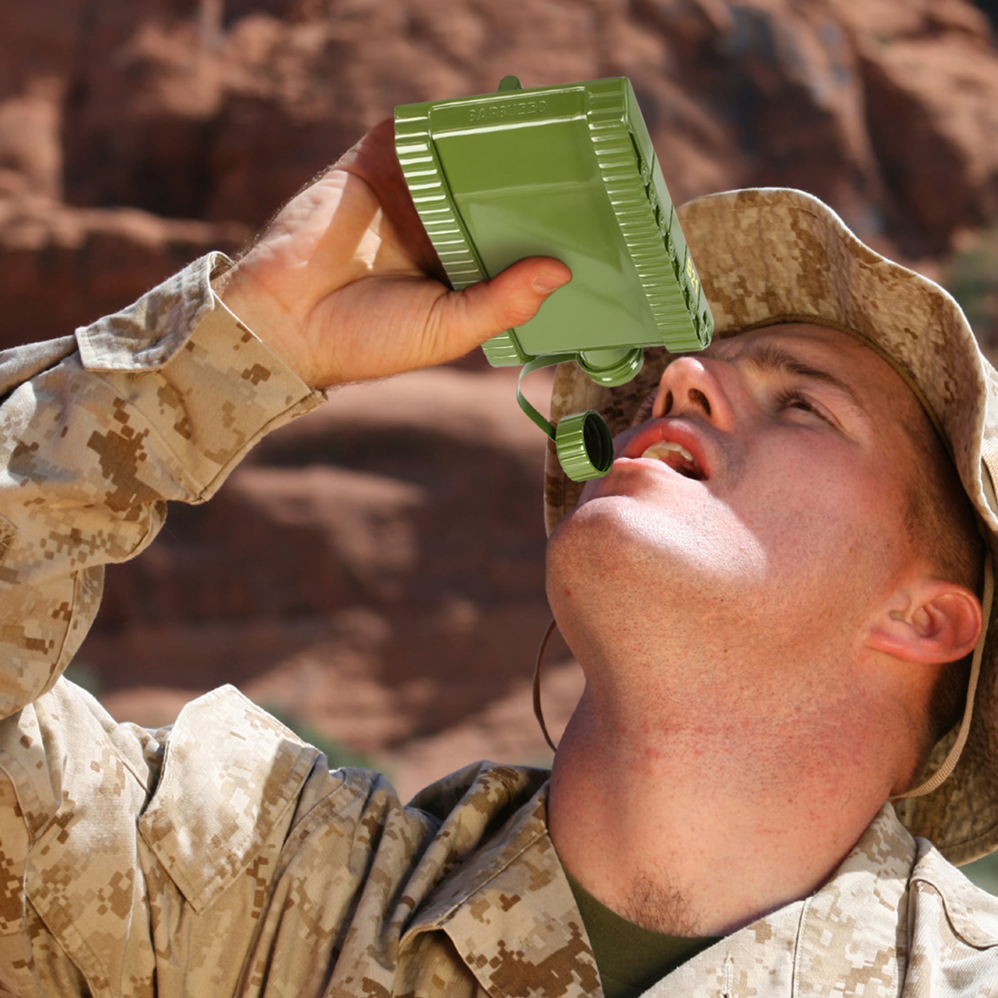 Caliber Gourmet Tank Flask CBG-SG-TFLASK in olive drab green being filled with amber spirits, embossed tank design visible