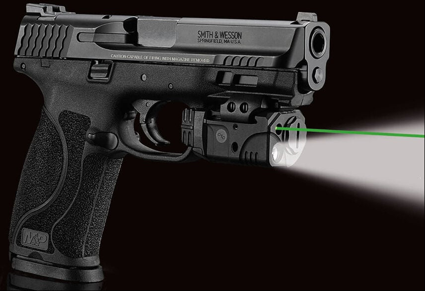 Smith & Wesson handgun with laser sight on a black background