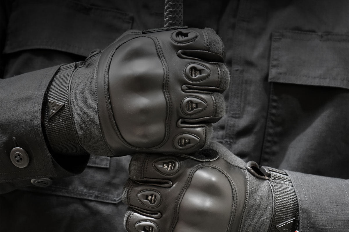 Damascus Phenom 6 Responder II rappel glove PG2 in black worn on both hands, hard knuckle guards and wrist straps