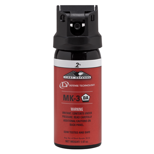 Red pepper spray canister with black top on a white background 