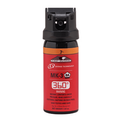 Red and black pepper spray canister with visible branding on a white background 
