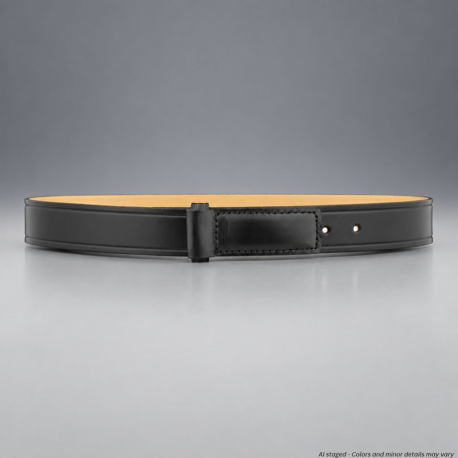 Dutyman 1211 plain black 1.5-inch full-grain leather hook garrison belt, shown looped with its natural leather interior against a gray studio background.