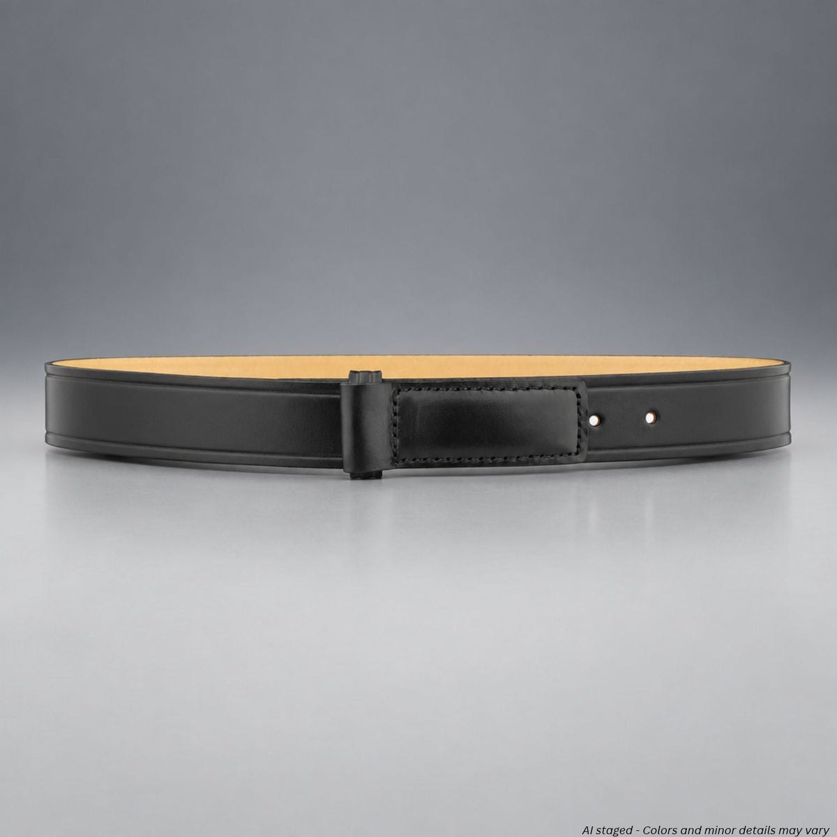 Dutyman 1211 plain black 1.5-inch full-grain leather hook garrison belt, shown looped with its natural leather interior against a gray studio background.